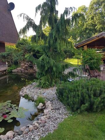 Фото номера Бунгало Делюкс с видом на сад Дома для отпуска Dream forest house of Kaunas Reservoir г. Šlienava 73