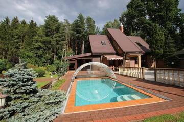 Фото номера Бунгало Делюкс с видом на сад Дома для отпуска Dream forest house of Kaunas Reservoir г. Šlienava 47