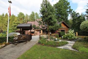 Фото номера Бунгало Делюкс с видом на сад Дома для отпуска Dream forest house of Kaunas Reservoir г. Šlienava 60