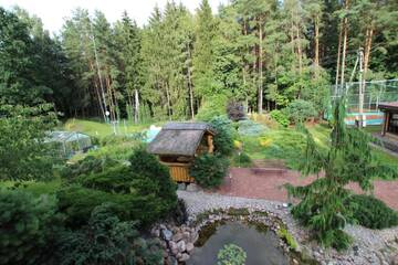 Фото номера Бунгало Делюкс с видом на сад Дома для отпуска Dream forest house of Kaunas Reservoir г. Šlienava 31